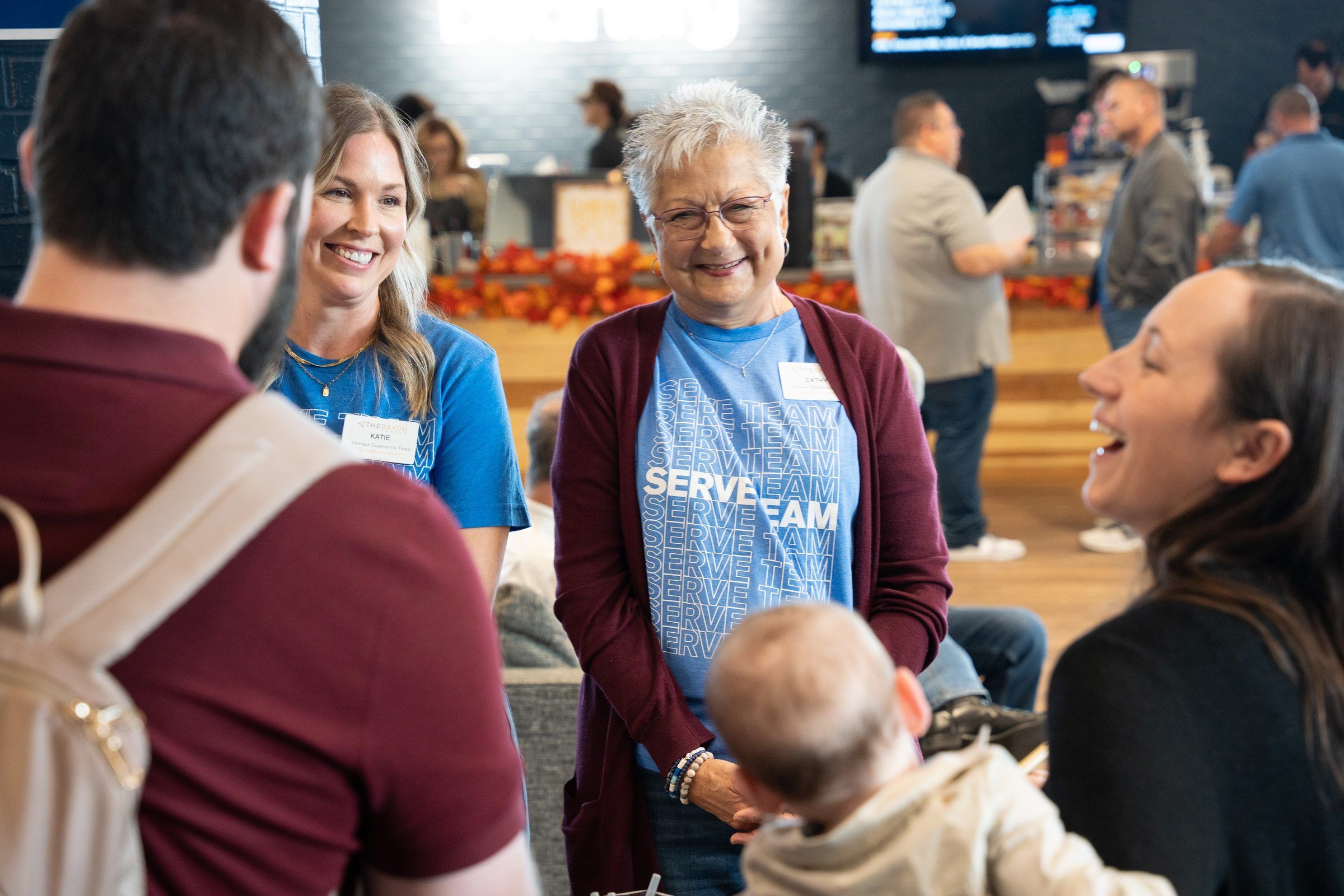 Greeters Welcoming a Family